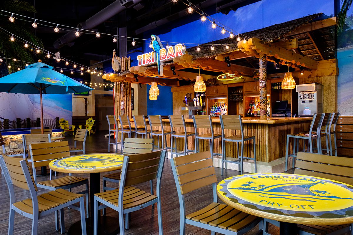 Tiki Bar Interior in blue with chairs and tables